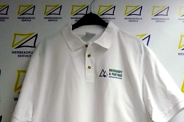 Beflockung Polo Hemd mit Bredehöft Logo